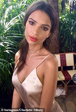 Dark hair and fair skin can pull off bold tones (pictured: Emily  Ratajkowski)