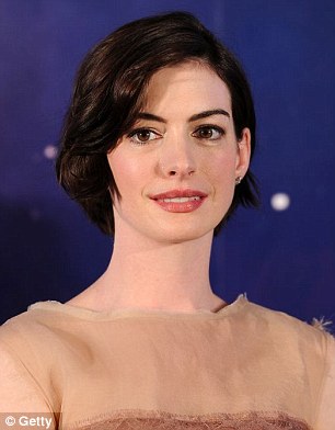 Ladies like  Anne Hathaway with brunette hair and paler skin tones should select muted peachy lipsticks, according to experts