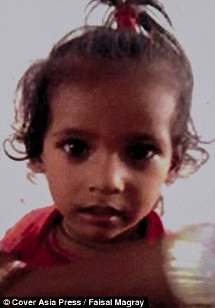 Taken: Aditya, pictured, was snatched from outside his family