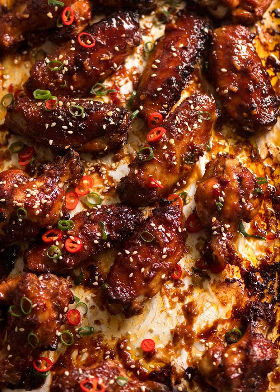 Close up of sticky baked Chinese chicken wings with Chinese marinade