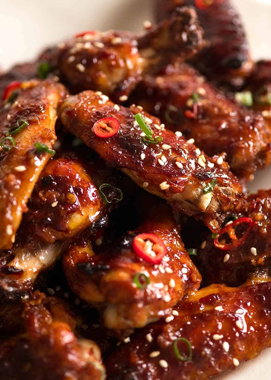 Close up of sticky baked wings (Chinese flavour), ready to be eaten